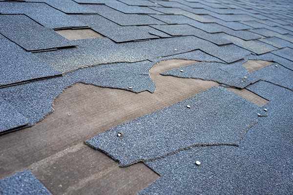 How To Spot Wind Damage On Your Roof Shingles