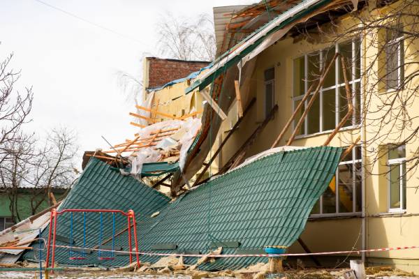 ripped-roof-laying-building-damage-caused-strong-wind